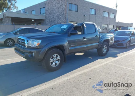 2009 Toyota Tacoma Base V6 из США, поврежденный, VIN 3TMLU42N59M025679